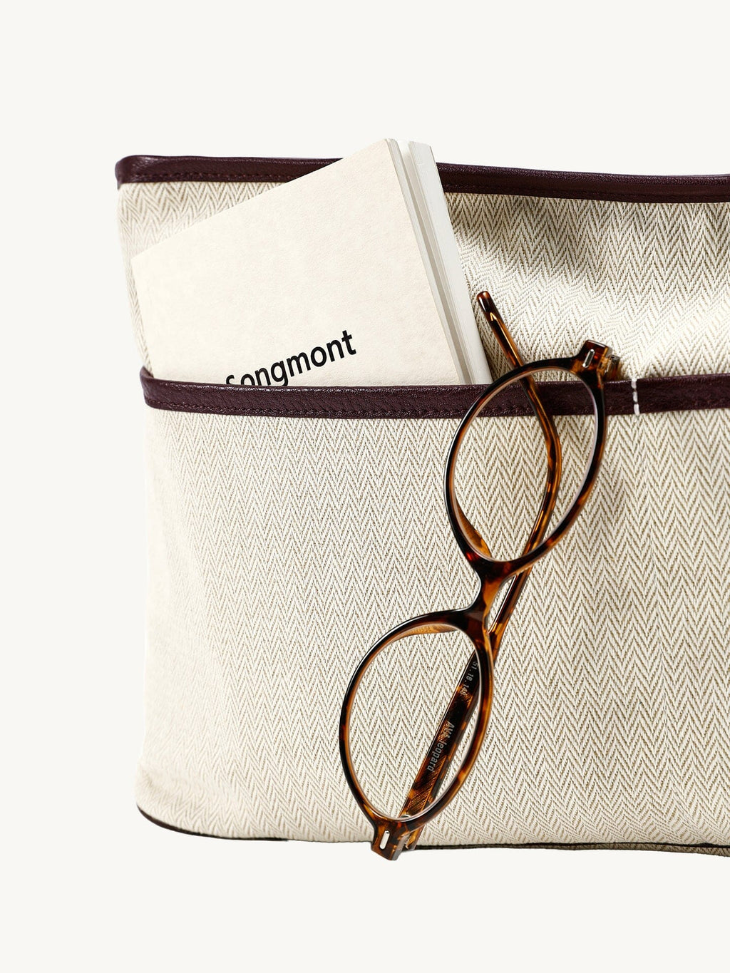 Songmont Large Yore Tote Bag Raisin - inner pouch pocket holding a notebook and glasses
