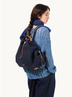 Songmont Medium Gather Backpack Set Indigo - worn as a backpack, side view