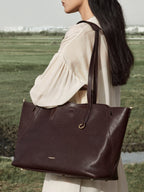 Songmont Large Yore Tote Bag Raisin - carried on the shoulder outdoors