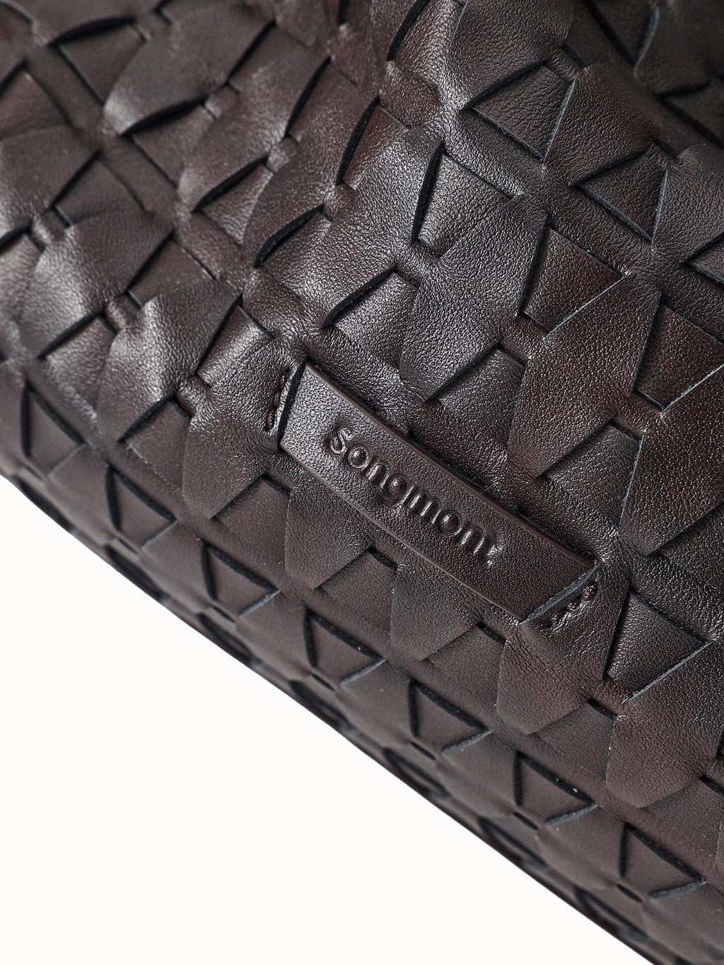 Songmont Small Gather Lattice Bag Ebony worn cross-body