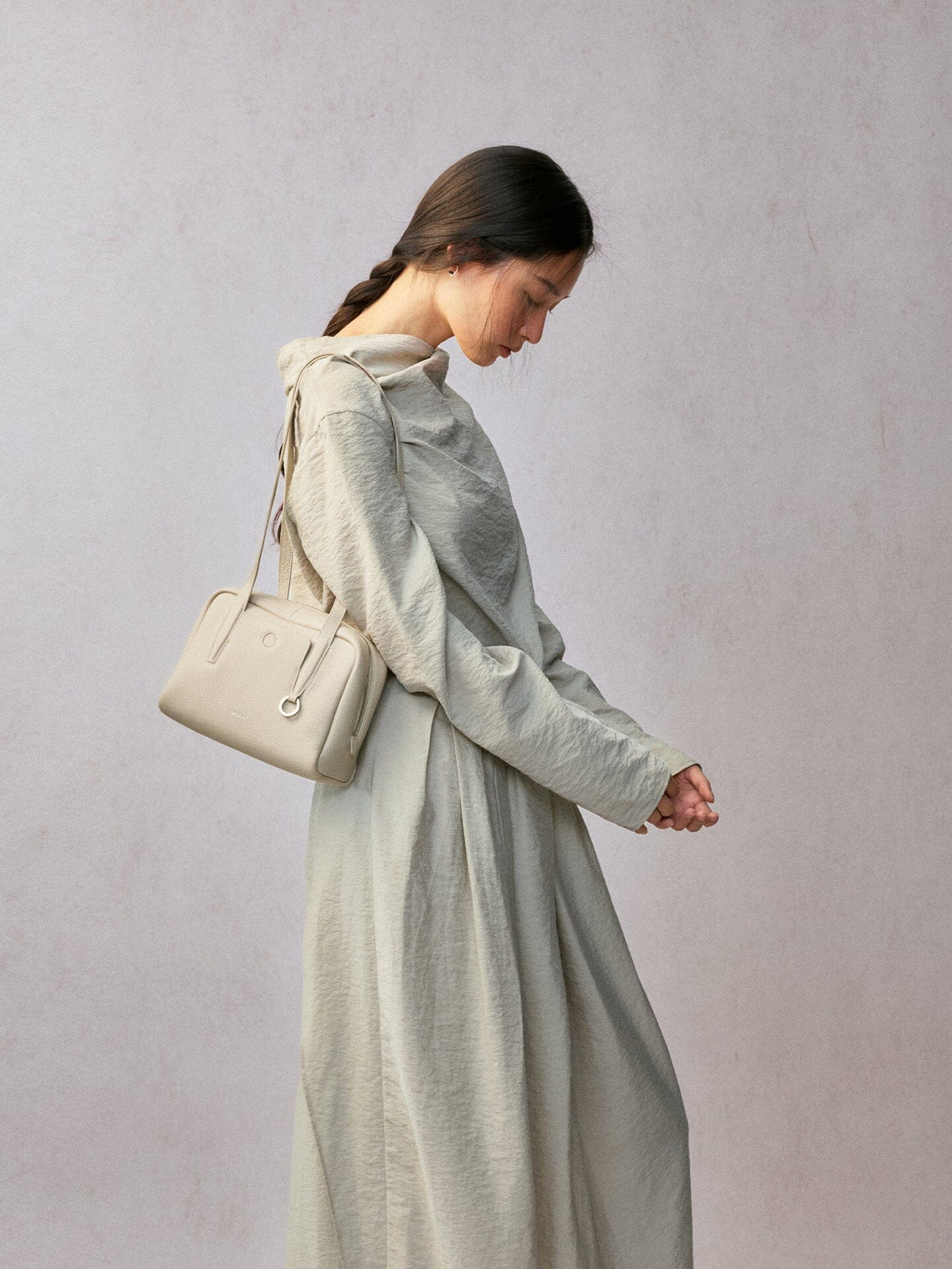 Songmont Small Yore Trunk Bag Cloud - worn on the shoulder, side view