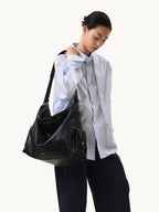 Songmont Extra Large Yore Hobo Bag Onyx - worn on the shoulder, front view