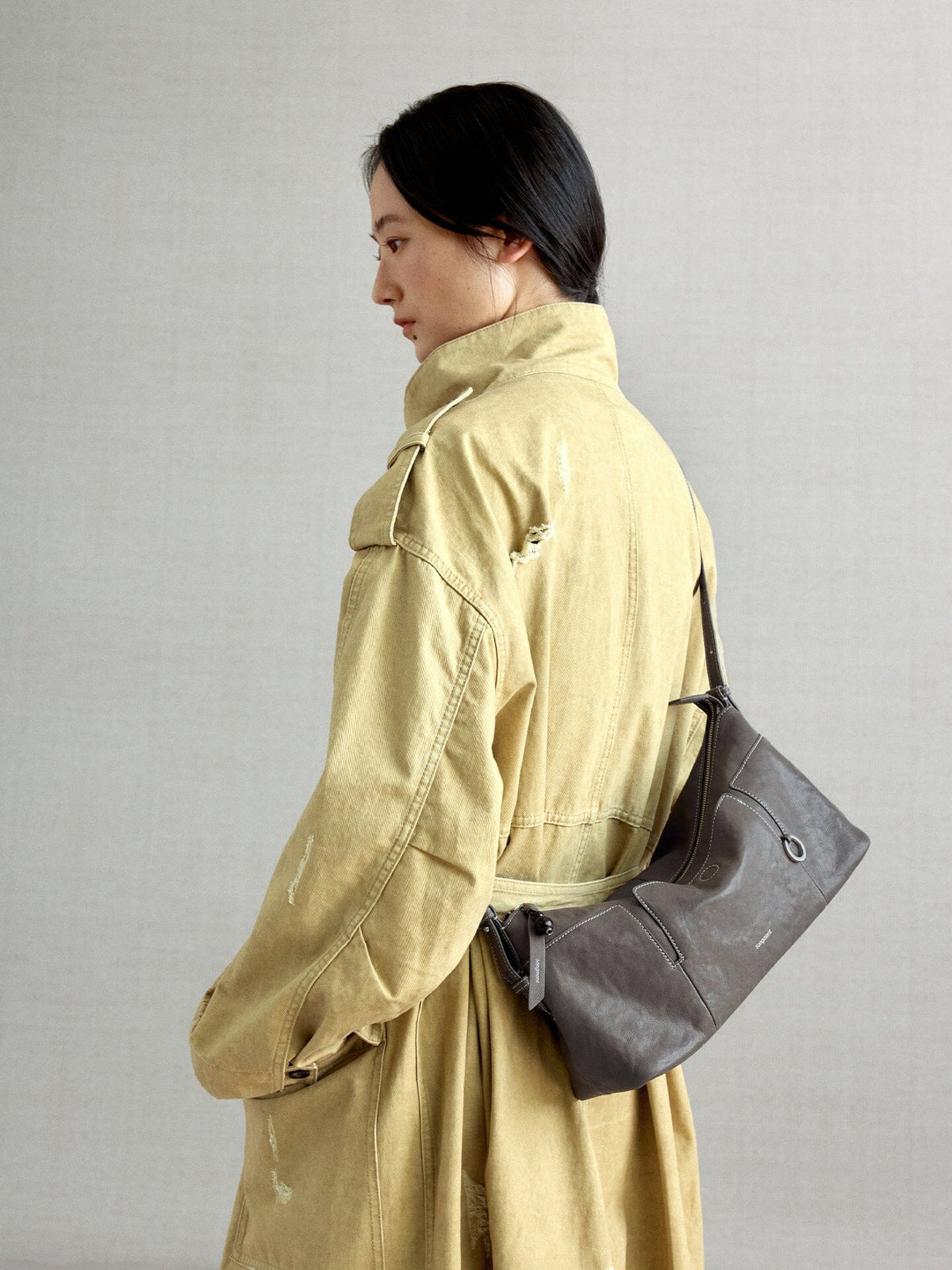 Songmont H Yore Bag Ink Grey - worn at the hip, back view
