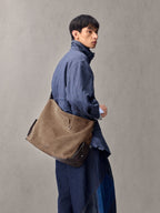 Songmont Extra Large Yore Hobo Bag Stone - worn across the body, side view