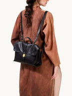 Songmont Small Shan Backpack Onyx - worn as a backpack with crossover straps