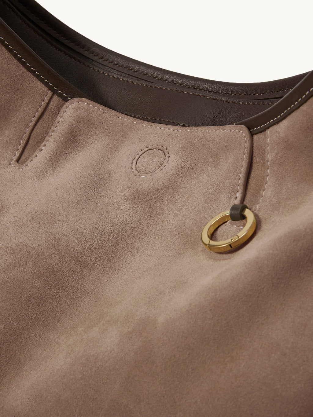 Songmont Extra Large Yore Hobo Bag Stone - front pocket with round snap and ring pull