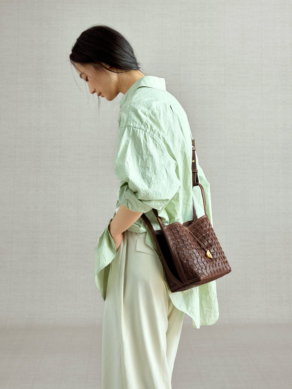 Songmont Lattice Bucket Bag Sandal - worn cross-body, side view