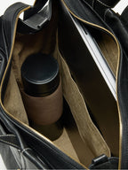 Songmont Large Yore Backpack Onyx - open interior holding a laptop and flask
