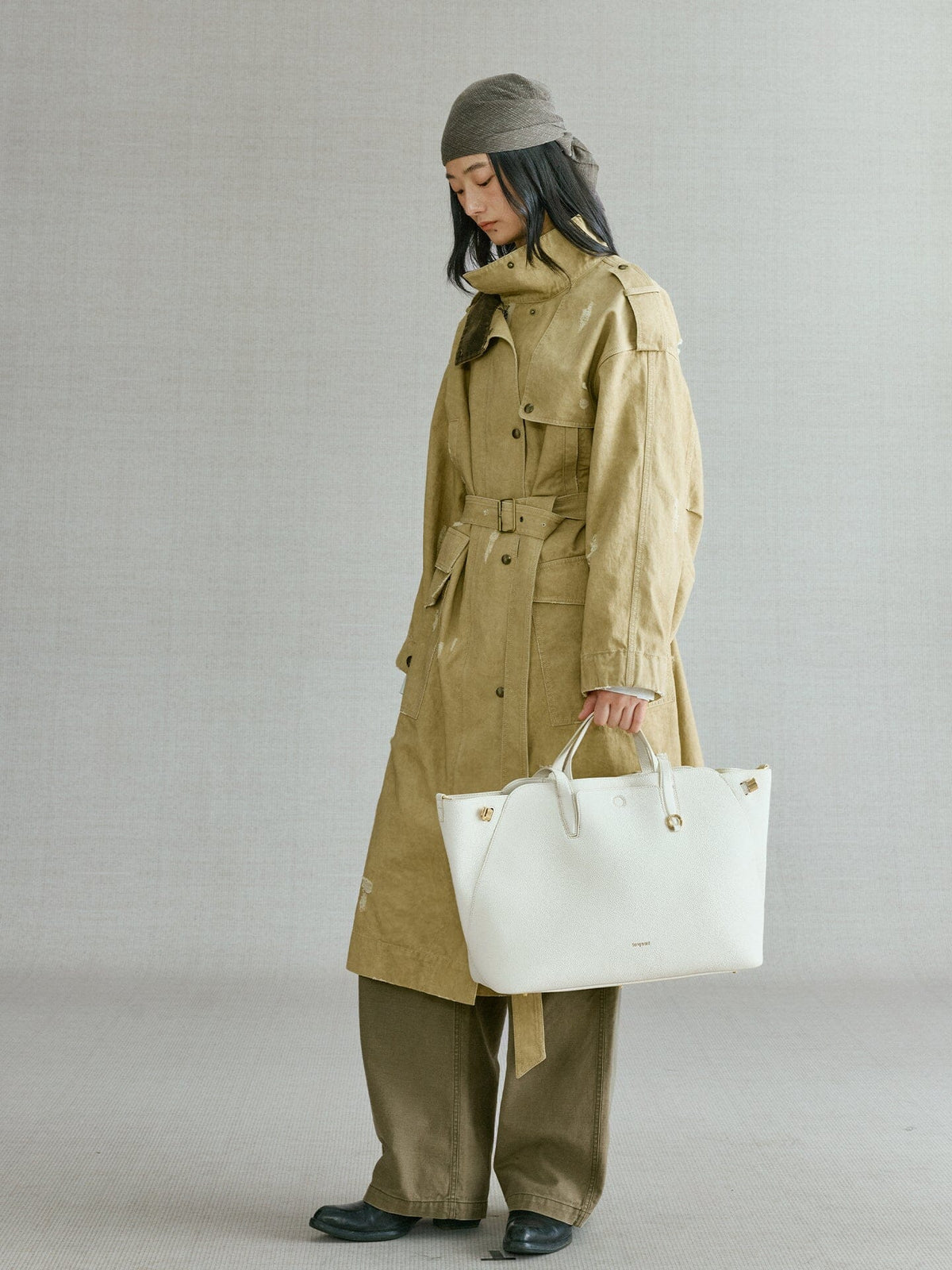 Songmont Large Yore Tote Bag Cloud - carried by the top handles at the side