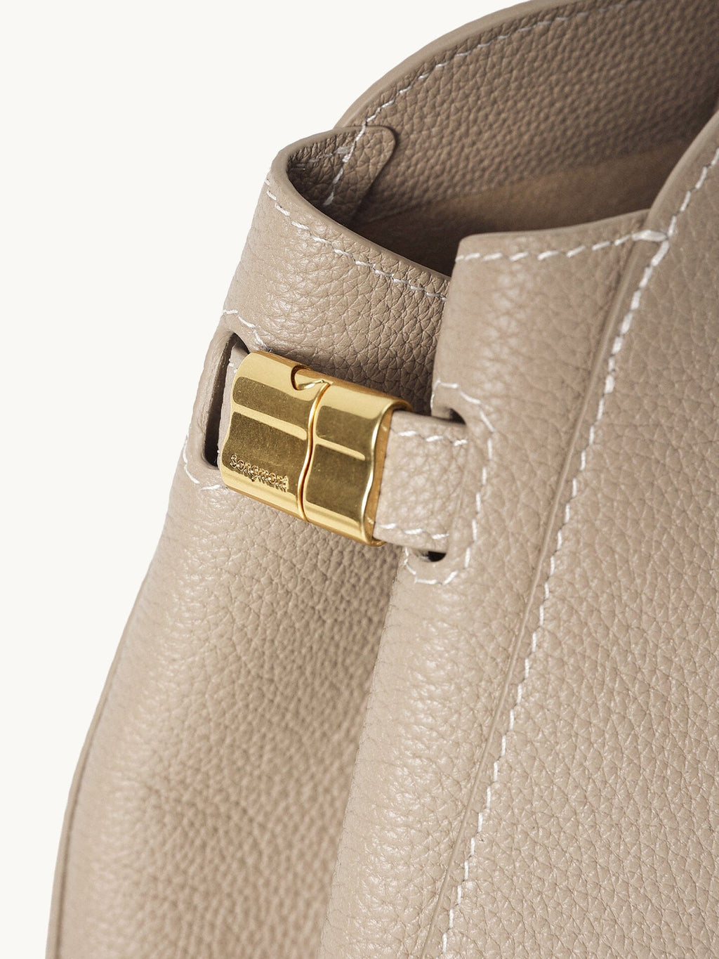 Songmont Large Yore Tote Bag Cobble - close-up of the gold side joint