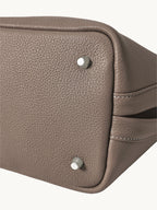 Songmont Song Bucket Bag Taupe - base feet detail