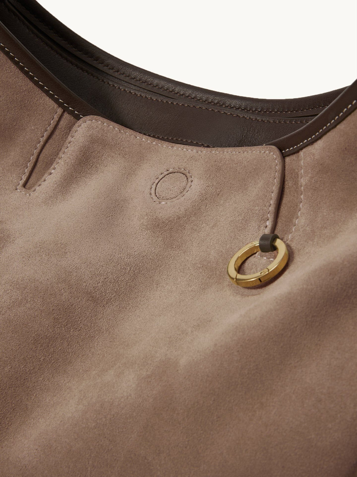 Songmont Large Yore Hobo Bag Stone - close-up of the taupe suede and gold ring