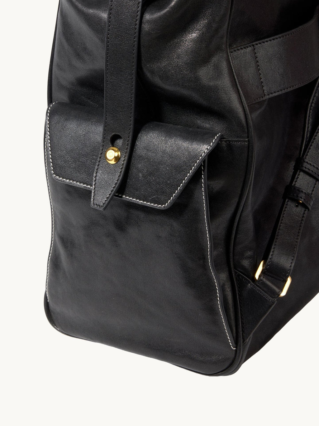Songmont Large Yore Backpack Onyx - side flap pocket and stitched edge detail