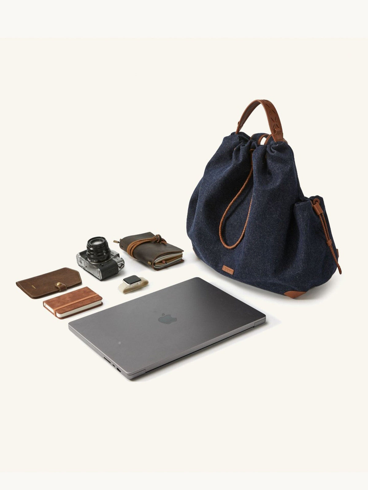 Songmont Medium Gather Backpack Set Indigo - styled flat lay with a laptop and camera
