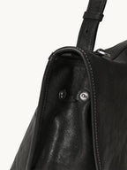Songmont Medium Shan Messenger Bag Onyx - side snap and flap detail