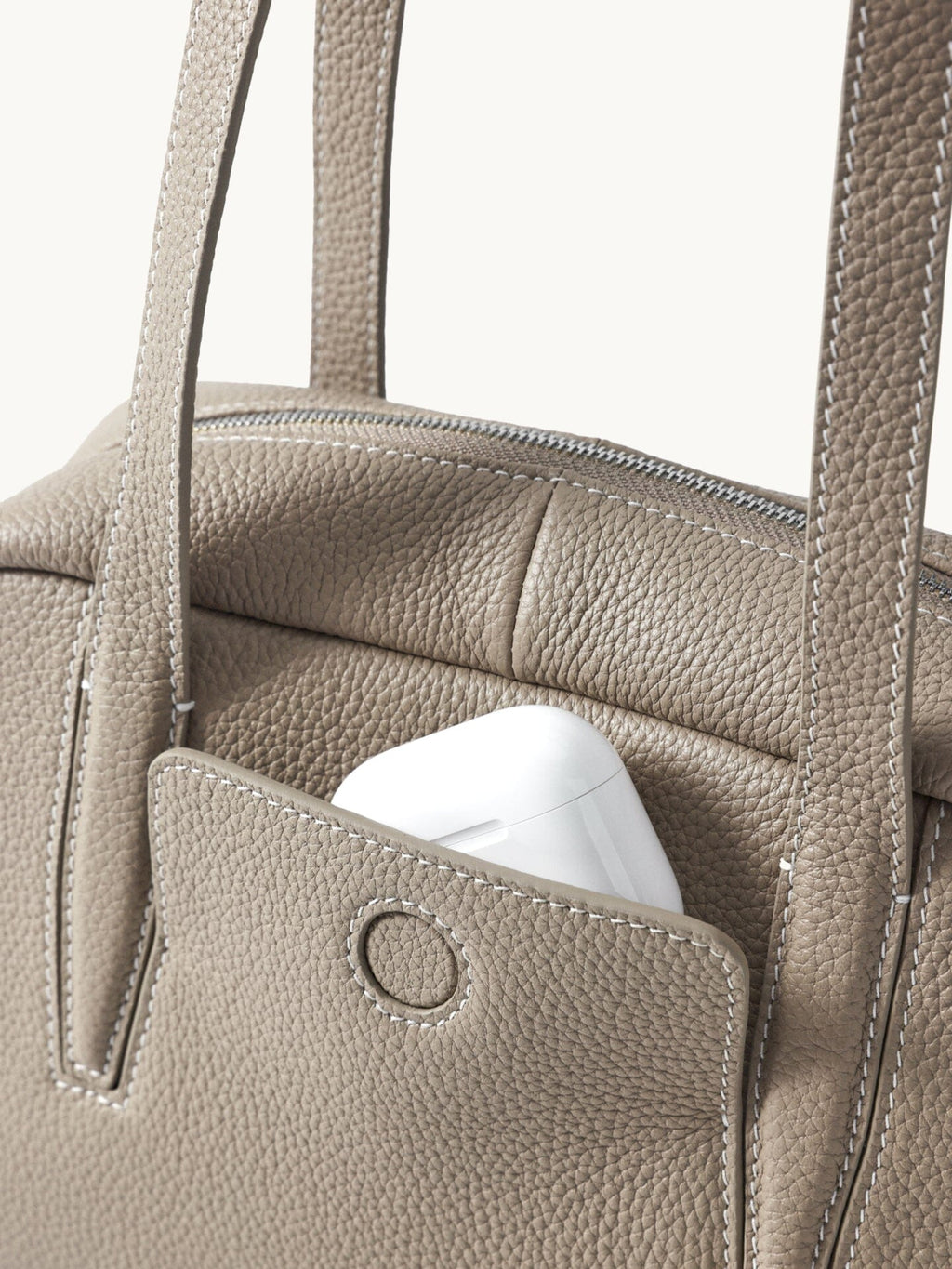 Songmont Small Yore Trunk Bag Smoke Grey - front pocket with a snap and earbud case