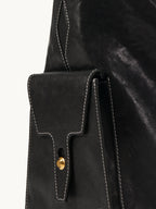 Songmont Extra Large Yore Hobo Bag Onyx - flap side pocket with white stitching