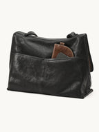 Songmont Medium Shan Messenger Bag Onyx - back view with exterior pocket