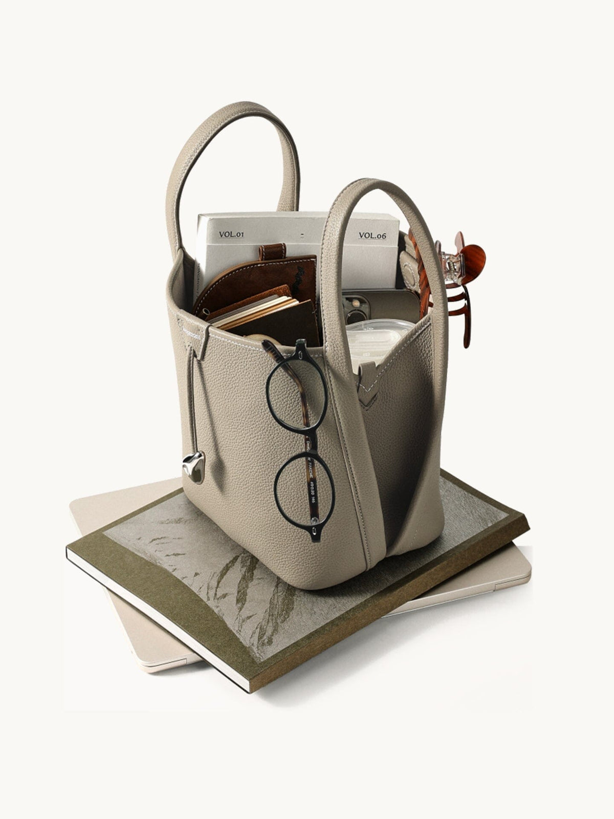 Songmont Song Bucket Bag Cobble - packed with books and essentials