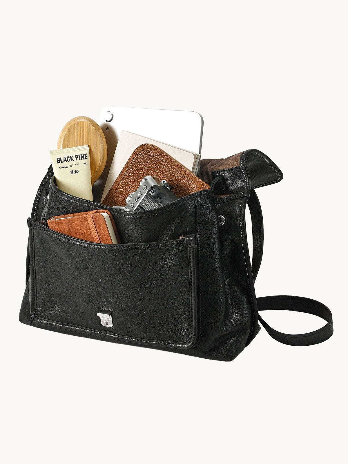 Songmont Small Shan Messenger Bag Onyx - open bag packed with everyday items