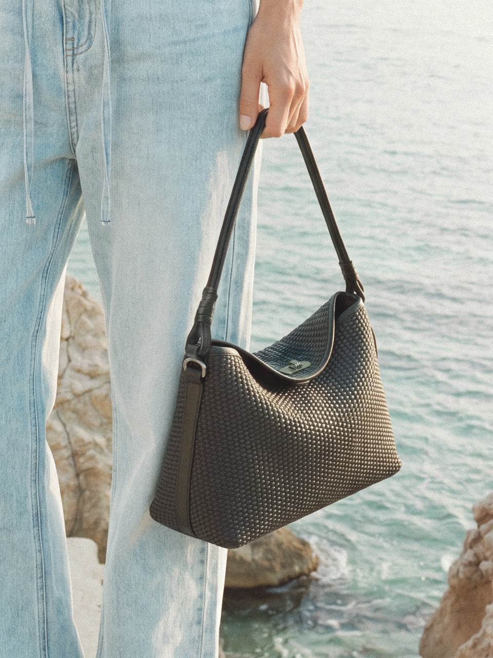 FOLNUA Dua Flap Bag Black Lapia side angle