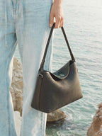 FOLNUA Dua Flap Bag Black Lapia side angle