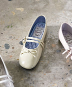 Rockfish Weatherwear Square Toe Two Strap Maryjanes Butter styled on concrete