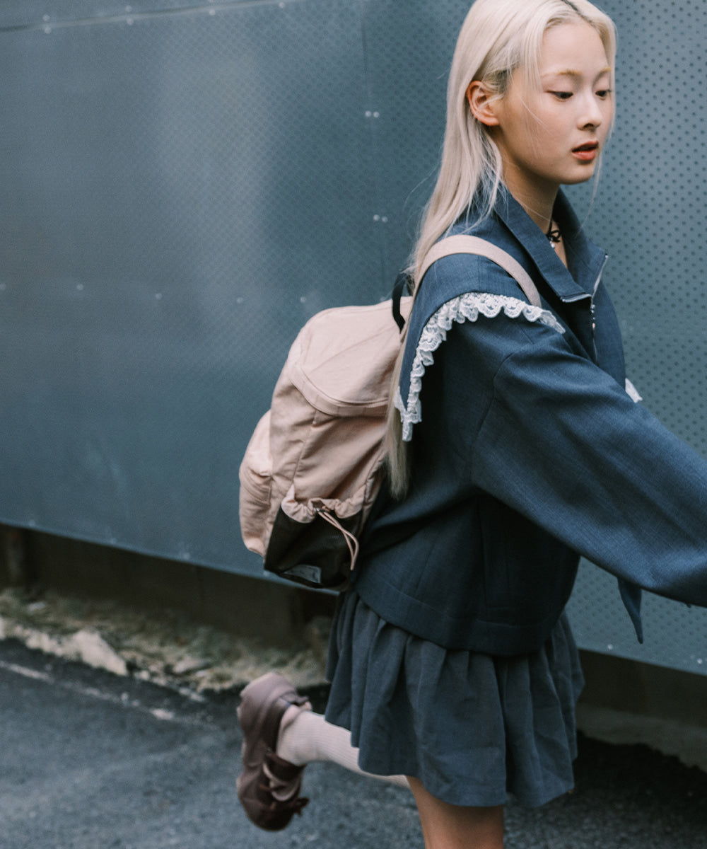 Rockfish Weatherwear Nylon Backpack Pink Beige worn on the back