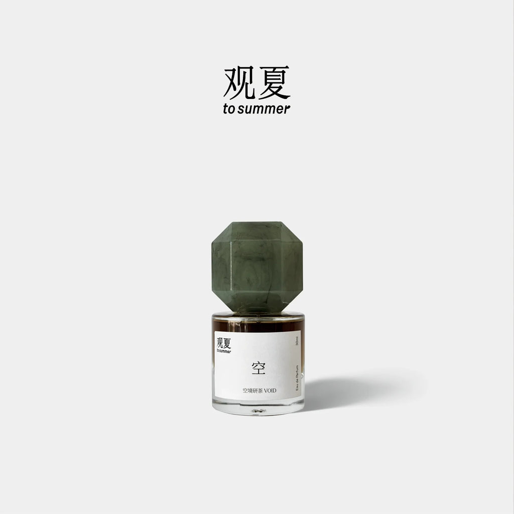 TO SUMMER Void Eau de Parfum jade-green cap bottle on light grey