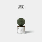 TO SUMMER Void Eau de Parfum jade-green cap bottle on light grey