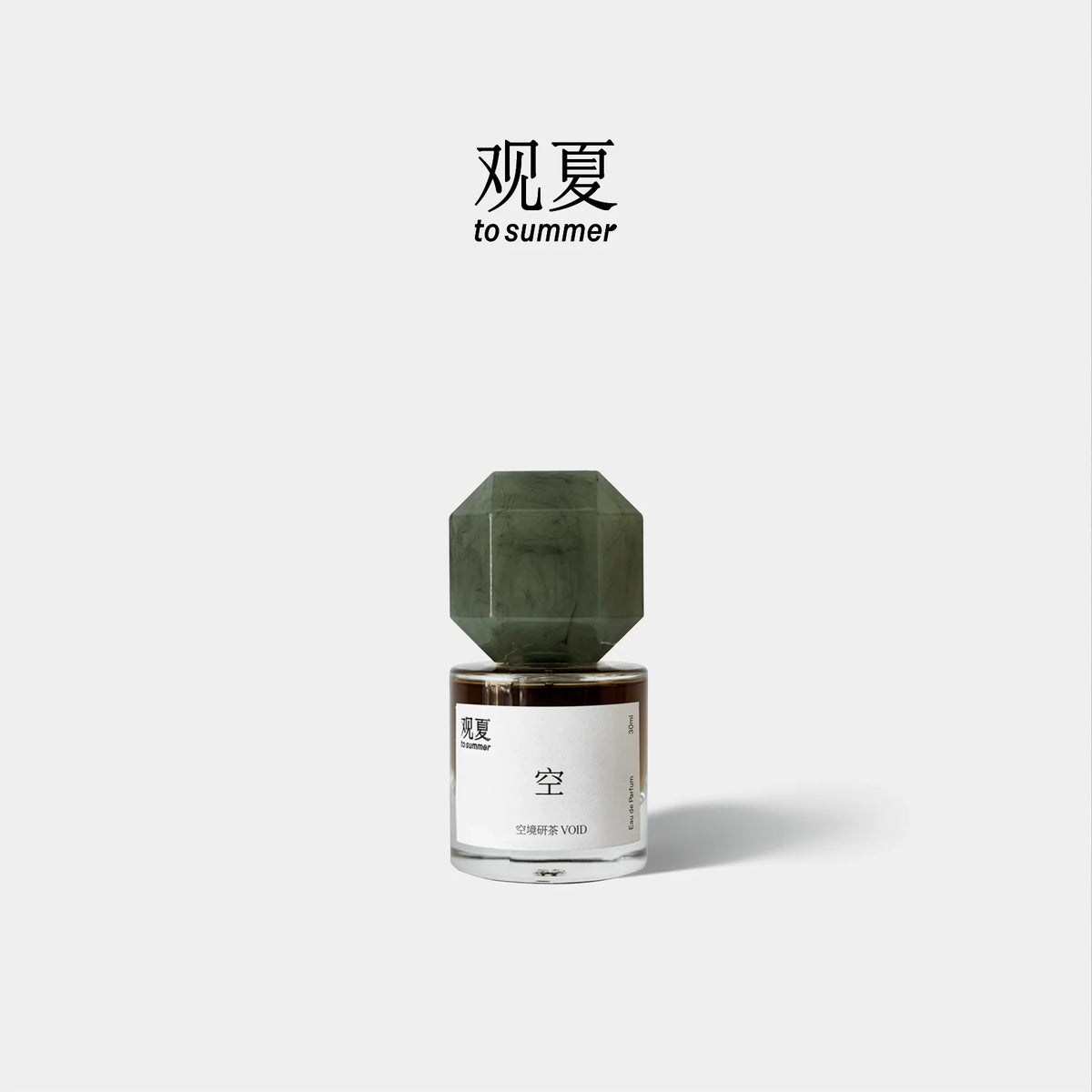 TO SUMMER Void Eau de Parfum jade-green cap bottle on light grey