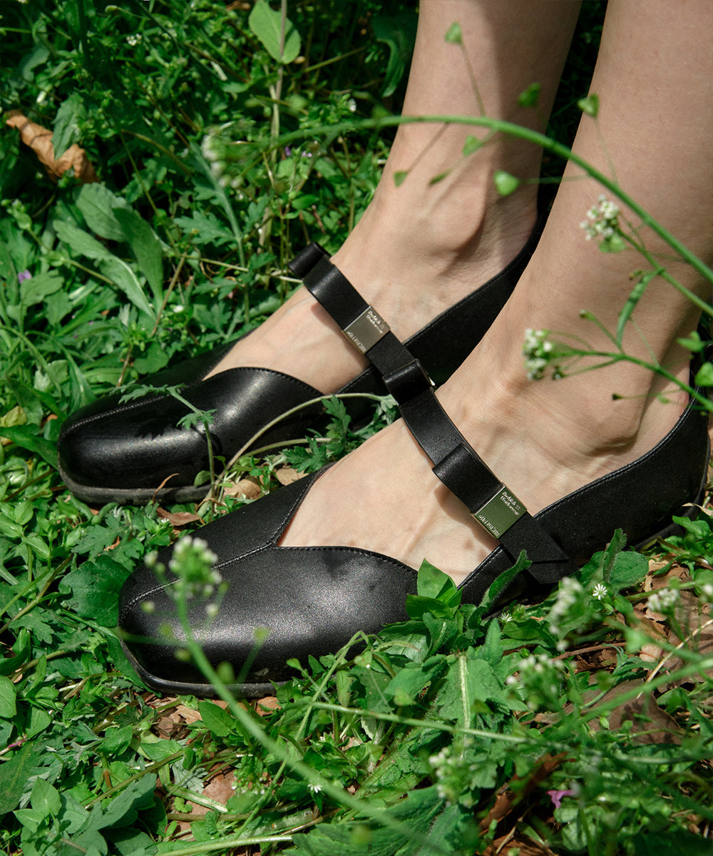 Rockfish Weatherwear X MINJUKIM Bliss Ribbon Sneakers Black, worn with ankle detail