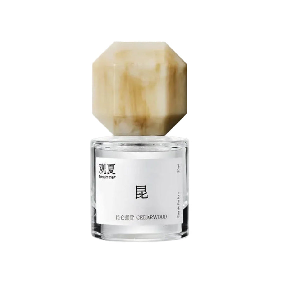 TO SUMMER Cedarwood Eau de Parfum 30ml bottle with a marbled octagonal cap