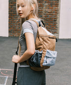 Rockfish Weatherwear Nylon Backpack Camel worn over the shoulder