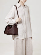 Songmont Drippy Roof Bag Burgundy - worn on the shoulder