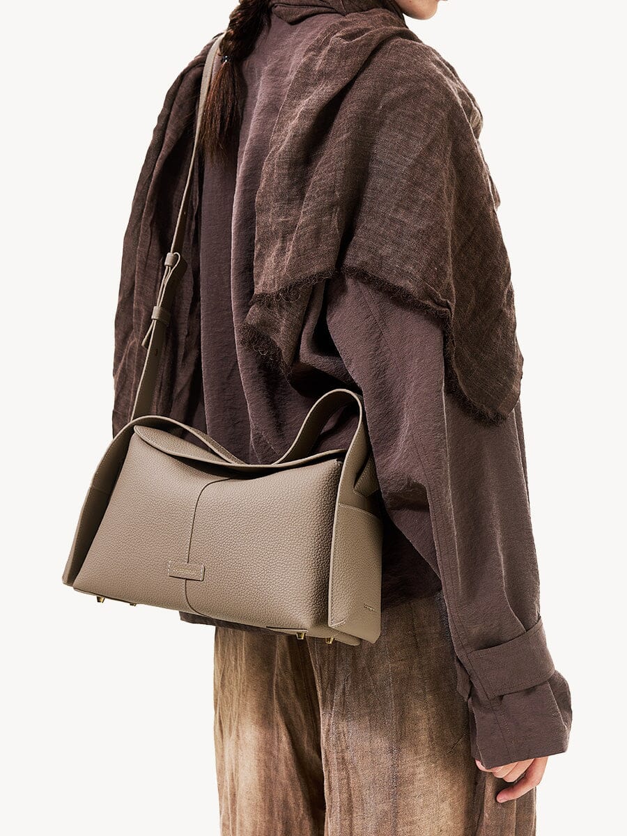 Songmont Drippy Roof Bag Cobble - worn crossbody, seen from behind