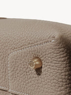 Songmont Drippy Roof Bag Cobble - metal foot and stitching close-up