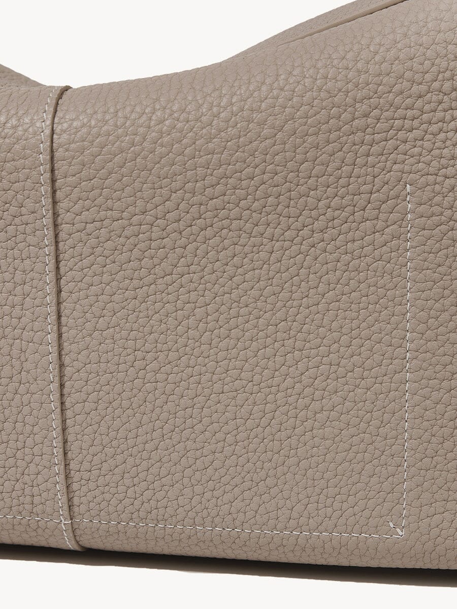 Songmont Drippy Roof Bag Cobble - flap and pebbled grain close-up