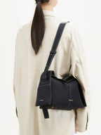 Songmont Drippy Roof Bag Onyx - worn crossbody, seen from behind