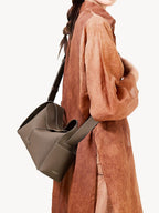 Songmont Drippy Roof Bag Taupe - worn crossbody, seen from behind