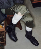 Rockfish Weatherwear Aster High Top Sneakers Black worn seated