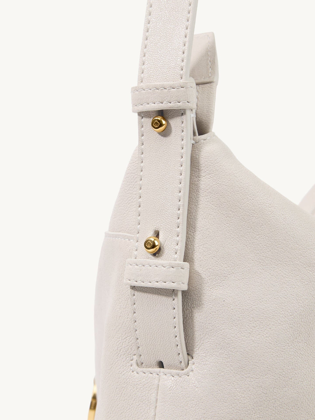 Songmont H Yore Bag Cloud - adjustable strap and gold stud detail