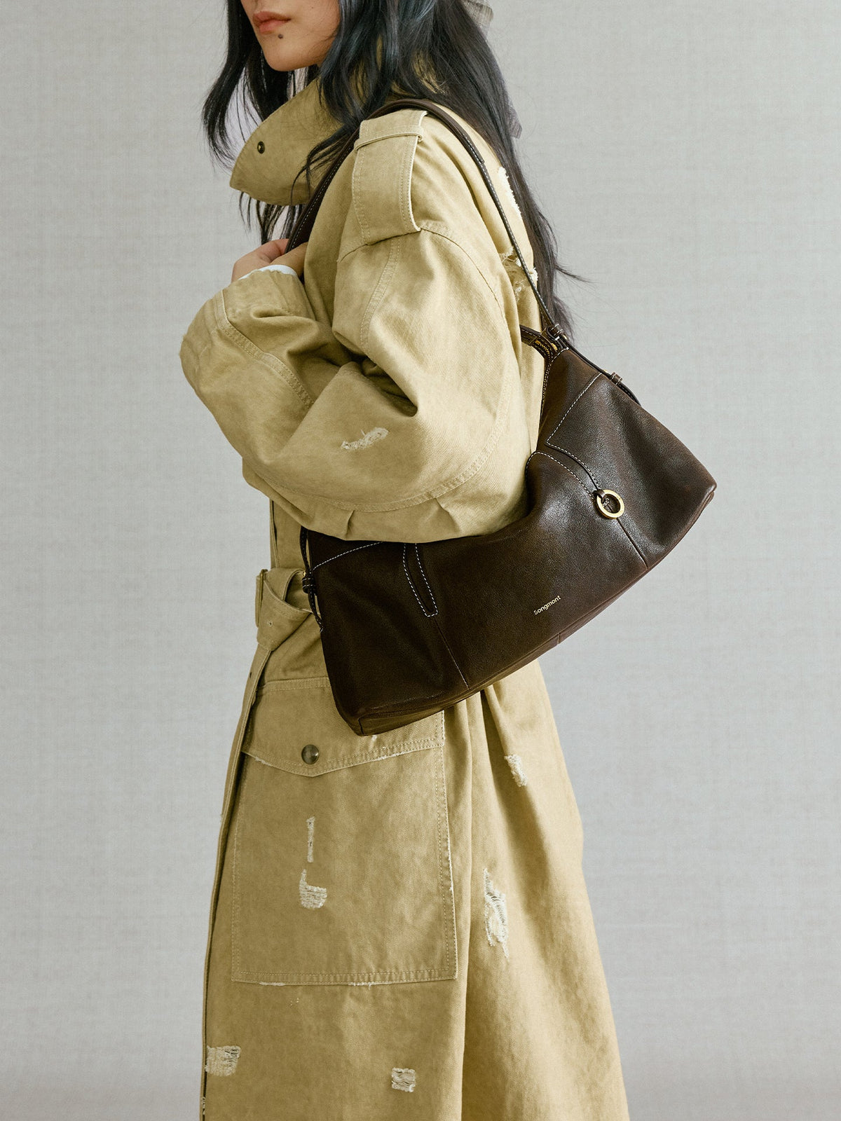 Songmont H Yore Bag Drab - worn on the shoulder, three-quarter view