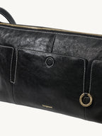 Songmont H Yore Bag Onyx - front pocket and gold ring close-up