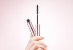 ReFa AIRA POINT KEEP Rose Gold open in hand with wand and cap