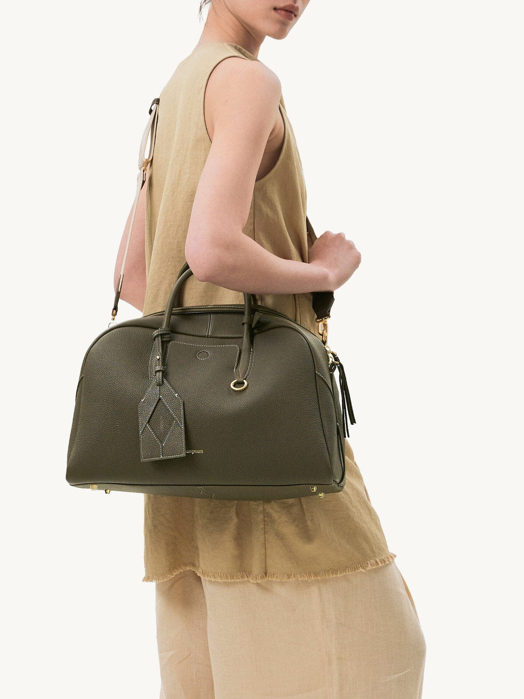 Songmont Large Yore Bowling Bag Moss - worn on the shoulder with the strap