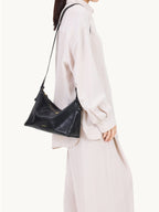 Songmont Large Yore Hobo Bag Onyx - worn on the shoulder, side view