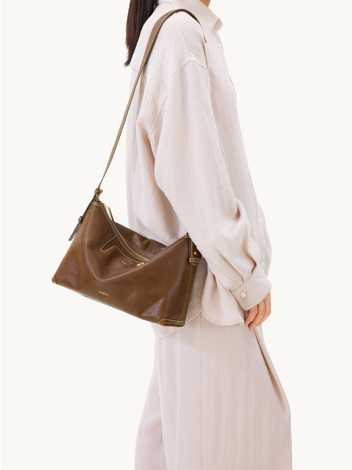 Songmont Large Yore Hobo Bag Sandal - worn on the shoulder, side view