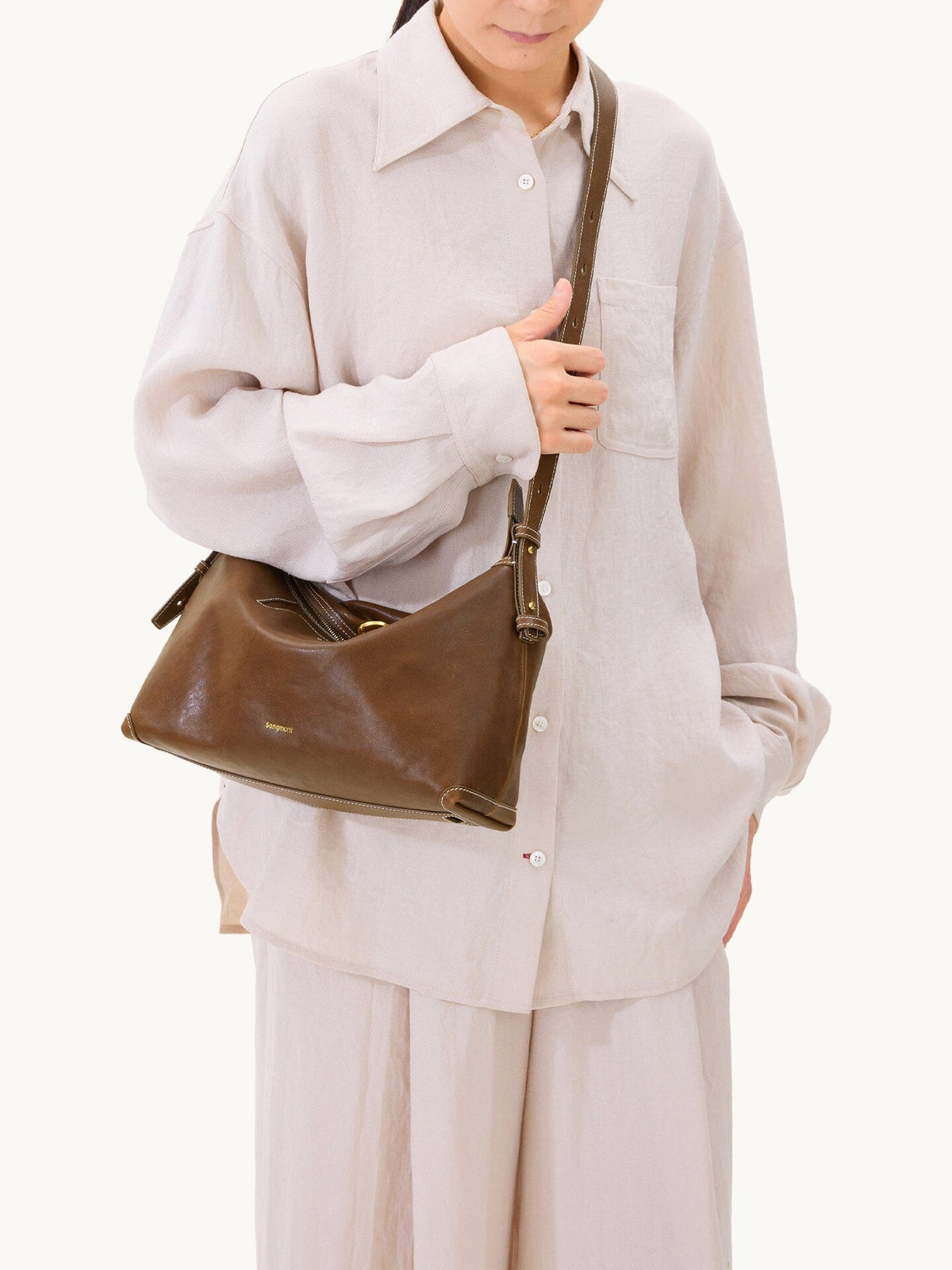 Songmont Large Yore Hobo Bag Sandal - worn cross-body, front view