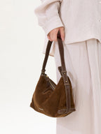 Songmont Large Yore Hobo Bag Sandal Suede - strap held in hand